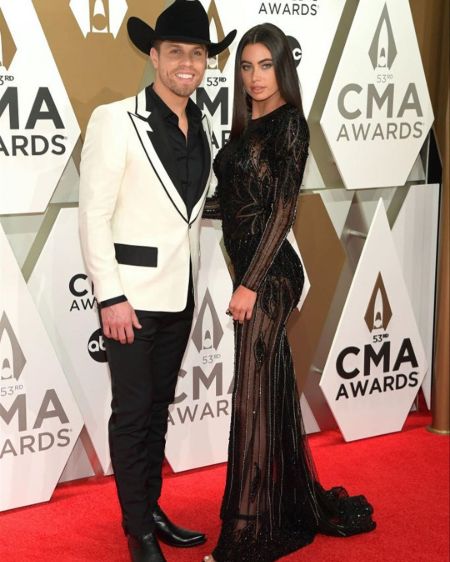 Instagram model Kelli Seymour poses a picture with boyfriend Dustin Lynch at the CMA Awards.
